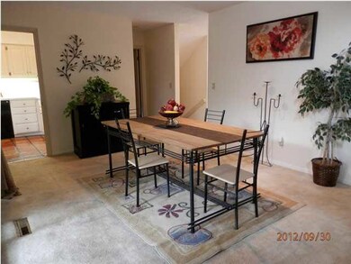 Formal dining w/ slider to patio and deck.
