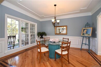 Formal Dining Room with wainscoting, subtle moldin