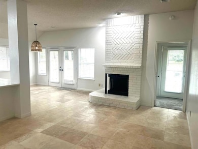 Open kitchen, brkfst & den (new light fixture)