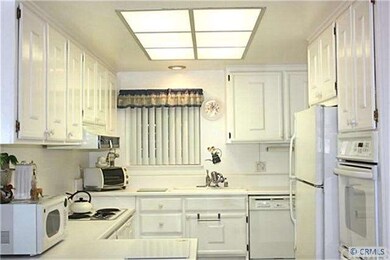 KITCHEN HAS TILE FLOOR, NEW SINK AND NEW WINDOW.