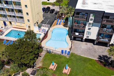 Drone / aerial view of a pool area