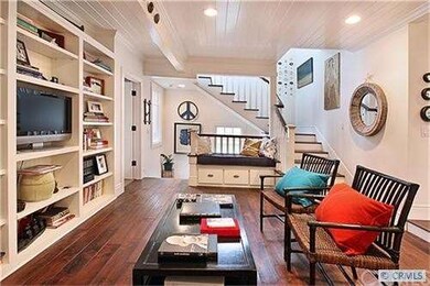 Upstairs family room with staircase to 3rd level d