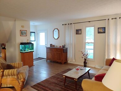 ENTRY WAY AND LIVING ROOM
