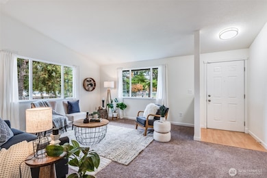 Upon entering, you will find the living room welcoming you with an abundance of natural light.