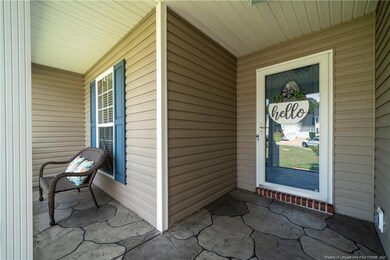 Shady front porch with stamped flooring