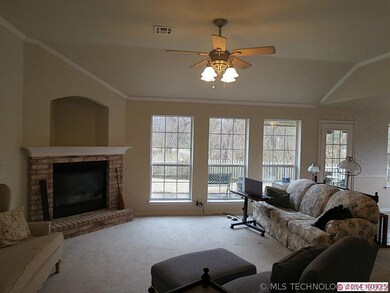 Wall of windows in the living room show off the be