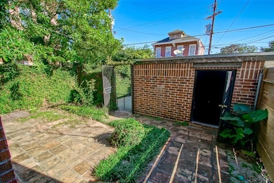 Front courtyard leading to garage