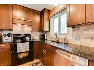 Granite counters with tile backsplash, new cabinet