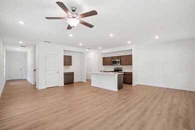 Family Room opens to Kitchen and Dining Area