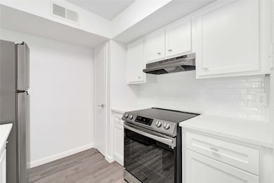 Open Concept Kitchen flows nicely into Dining Area & Living Room