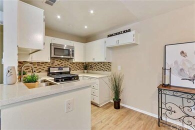 Kitchen with recessed lighting, new appliances and