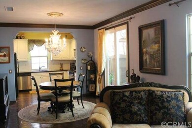 Dining area and kitchen view from living room. Cha