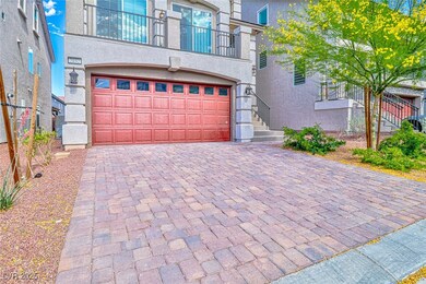 Garage with decorative driveway