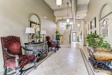 Stunning grand entry way with open ceiling and mod
