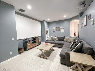 Living Room with Large Screen and Projector