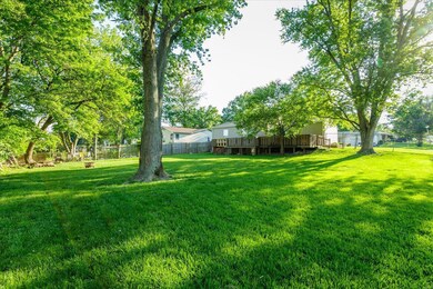 Rear Elevation with Mature Trees and Level Yard