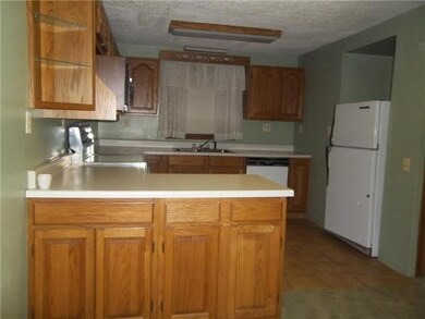 Kitchen Main kitchen with oak cabinets