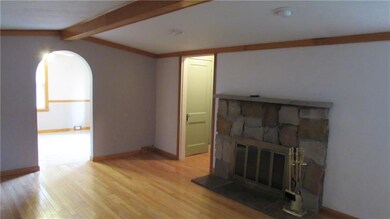Stone Fireplace with Gas Insert. Was originally Wo