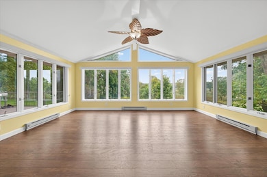 Main floor family room with vaulted ceilings and views of the Nature Reserve
