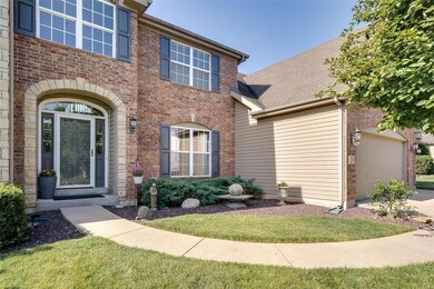Mature landscaping creates a welcoming front door.