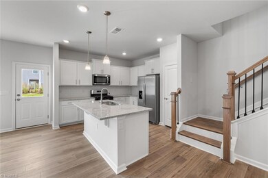 1006 Poets Walk Rd, Whitsett, NC 27377 - photo 7