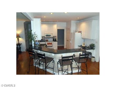 Kitchen - The kitchen offers granite counters, inc