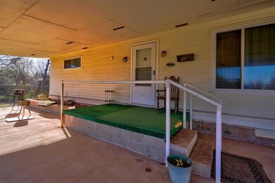 Entrance to property with a patio area