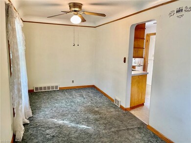 Formal dining area open to kitchen and living room