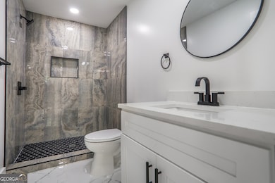 4307 Cedar Wood Dr SW, Lilburn, GA 30047 - photo 5