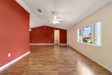 Alt. view of living room.