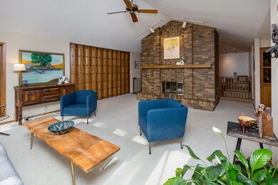 Beautiful ceiling-high brick fireplace