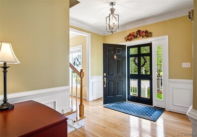 Foyer view to stairs and formal living room