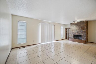 Unfurnished living room featuring a healthy amount