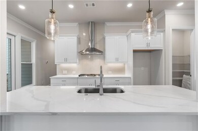 Neutral tones in the kitchen create a clean palette.