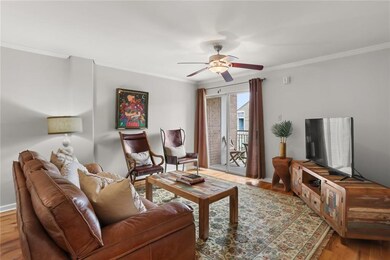 Living space with balcony access.