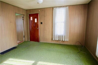 Living Room toward Main Entrance and first bedroom