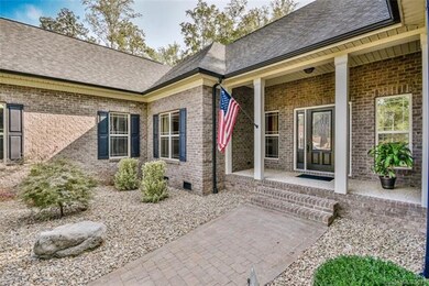 Only a few steps to the front porch, which is cove