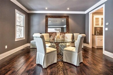 The spacious dining room that can easily accommodate a large group.  The adjoining butler's pantry makes this ideal for entertaining.