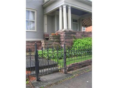 Facade/Exterior Front Charming front iron fence an