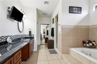  Primary bathroom with granite countertops double