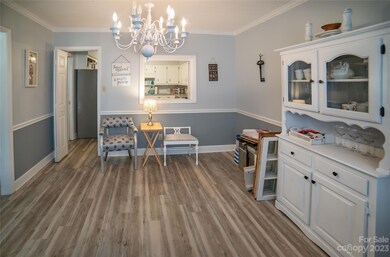 Dining are featuring bay window, access to kitchen