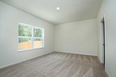 Homeowners will adore the spacious primary suite, showcasing a huge bedroom, windows and a stunning bathroom.