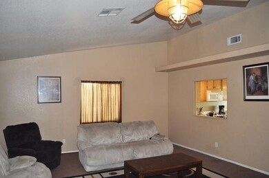 Living room toward kitchen