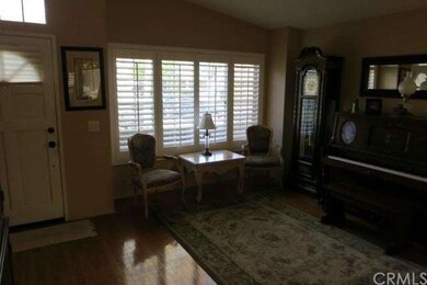 The door leading back outside and formal living ar