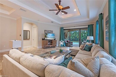 Great Room featuring ceiling fan, Crown molding, a