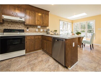 Kitchen with new vinyl tile flooring, backsplash, 