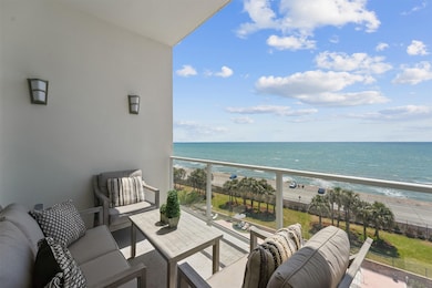 Spacious private balcony with panoramic Gulf views—perfect for morning coffee, watching pelicans fly by, or enjoying the coastal breeze.
