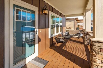 Sunny front porch with ample room for relaxing