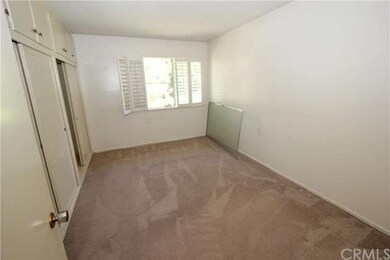 Bedroom or office with lots of closet space.