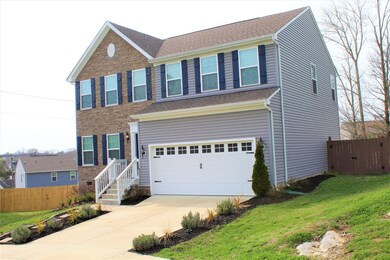 Situated on a slight hill, this home overlooks the neighborhood
